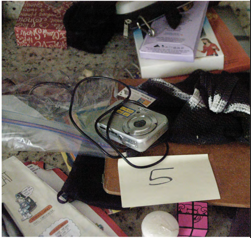 FBI search photo — Sony Cybershot camera on downstairs countertop, labeled Item 5